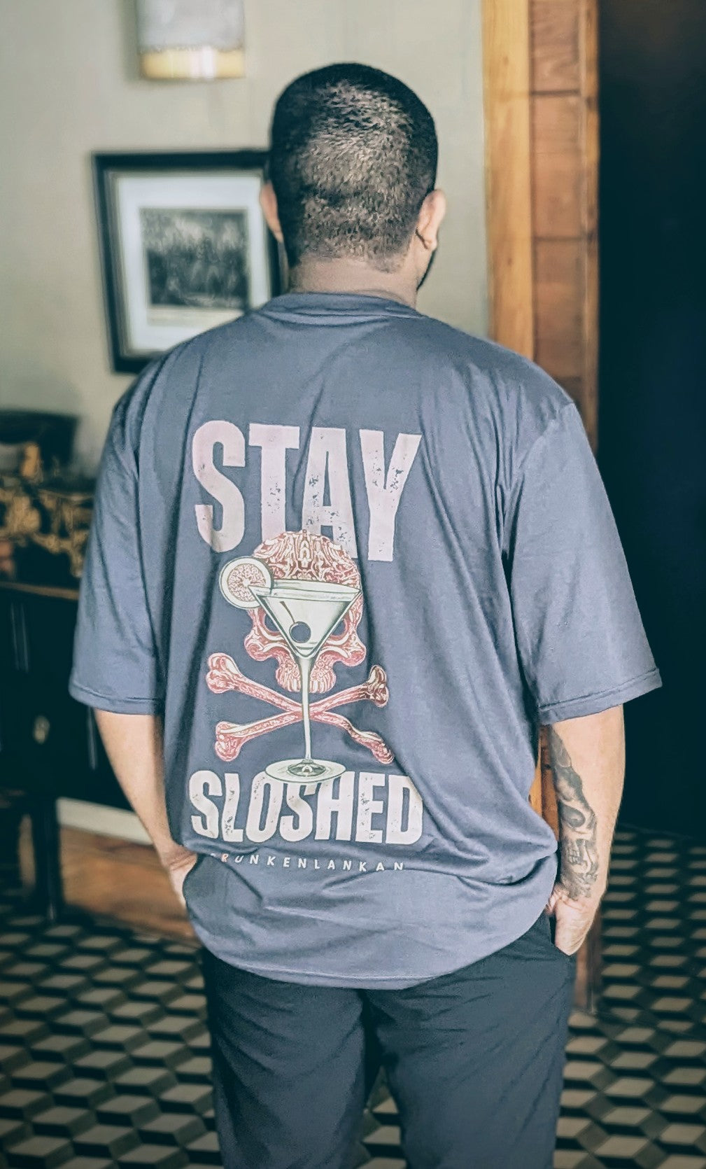 Drunkenlankan grey oversized T-shirt with Stay Sloshed design. (hospitality mentality)